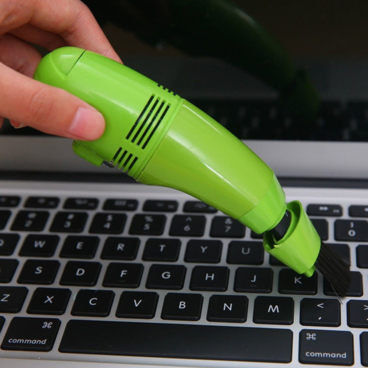 Compact USB mini vacuum cleaner for precise cleaning of keyboards and car interiors. Main image
