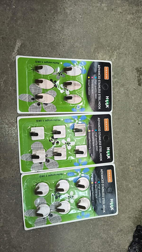 Mounted self adhesive wall hooks holding various items