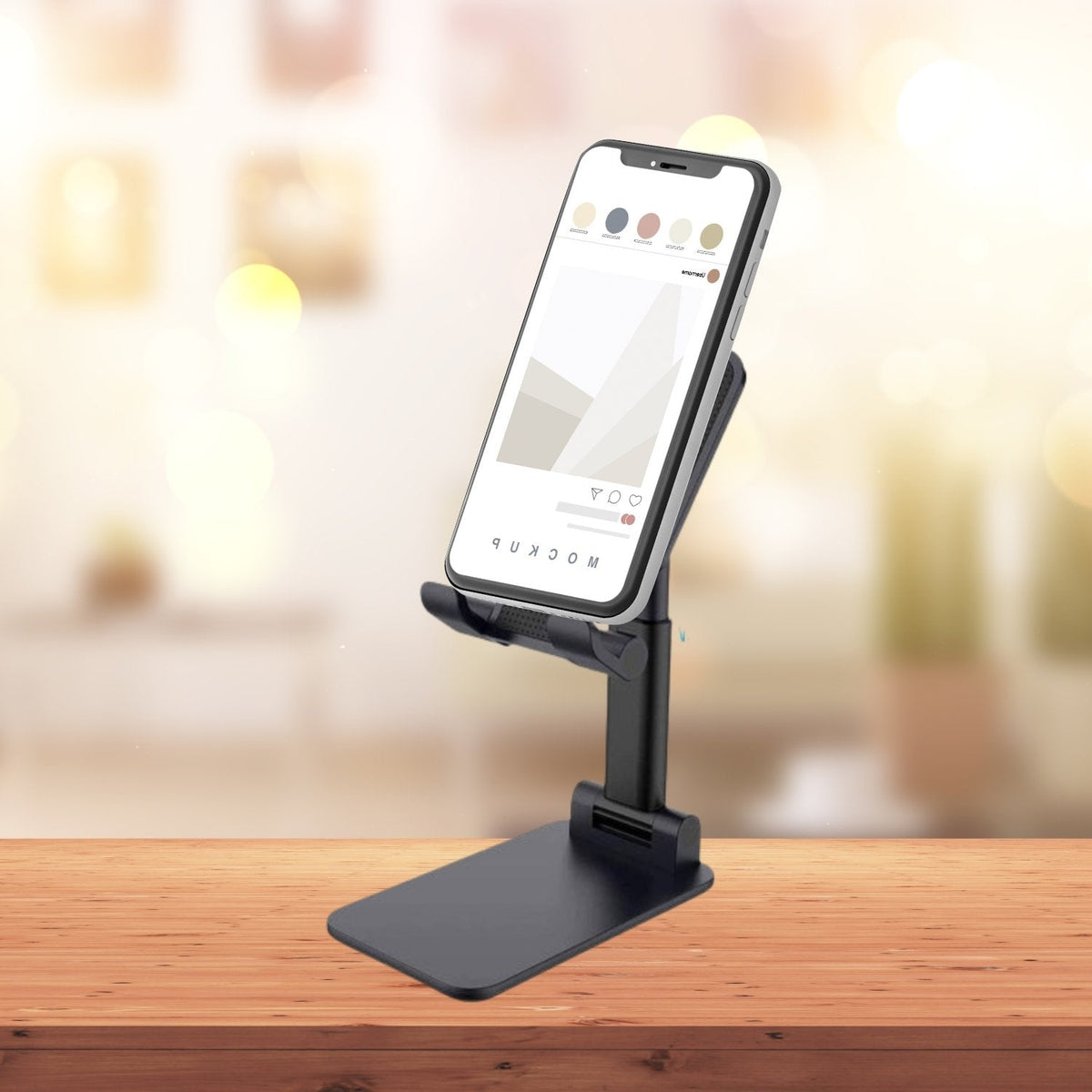 PHOBIA Foldable Mobile Stand in black, ready for use on a desk. Main image