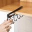 Double-row metal cup holder rack hanging mugs and cups in a modern kitchen.