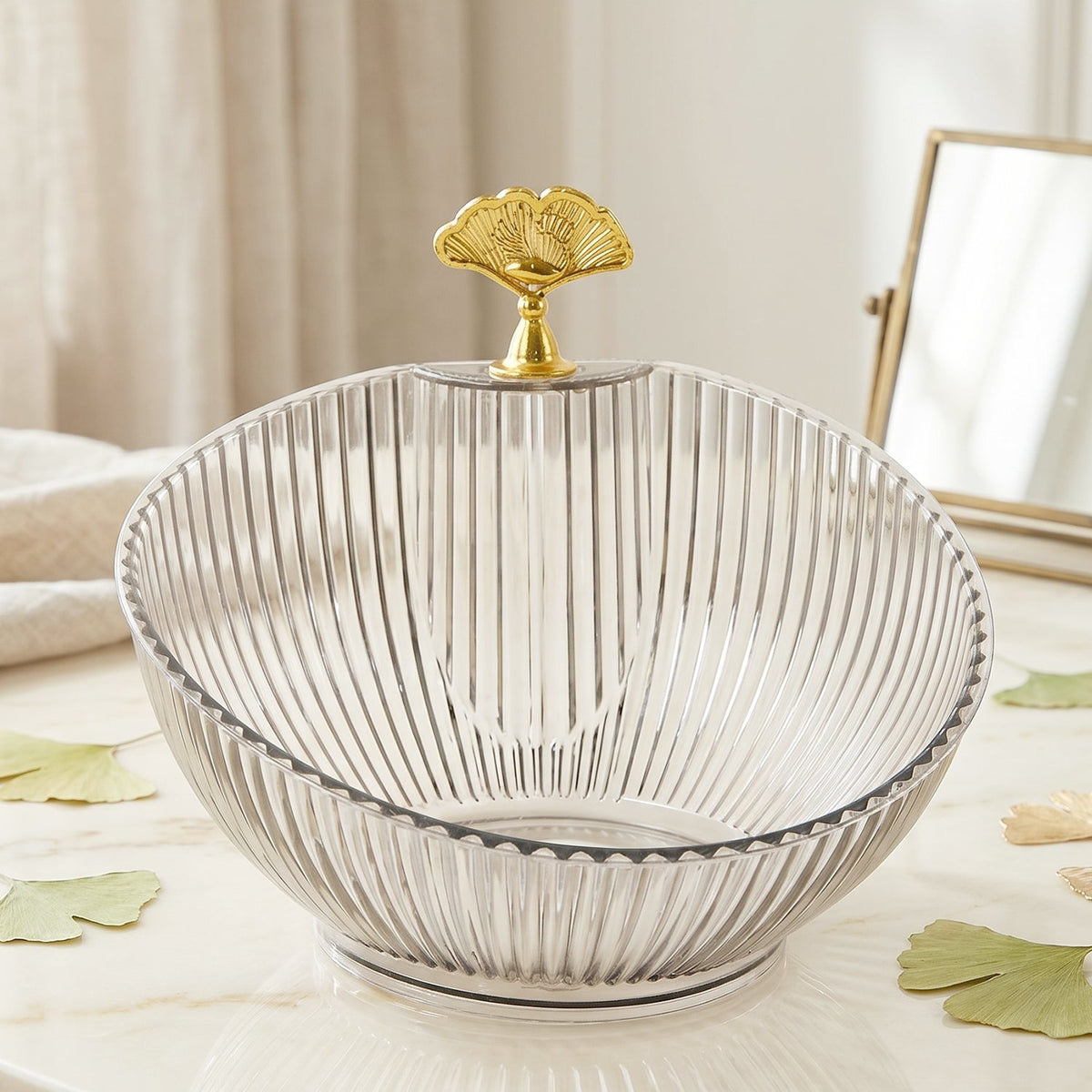 Decorative plastic fruit bowl with ribbed clear design and gold accent Main image