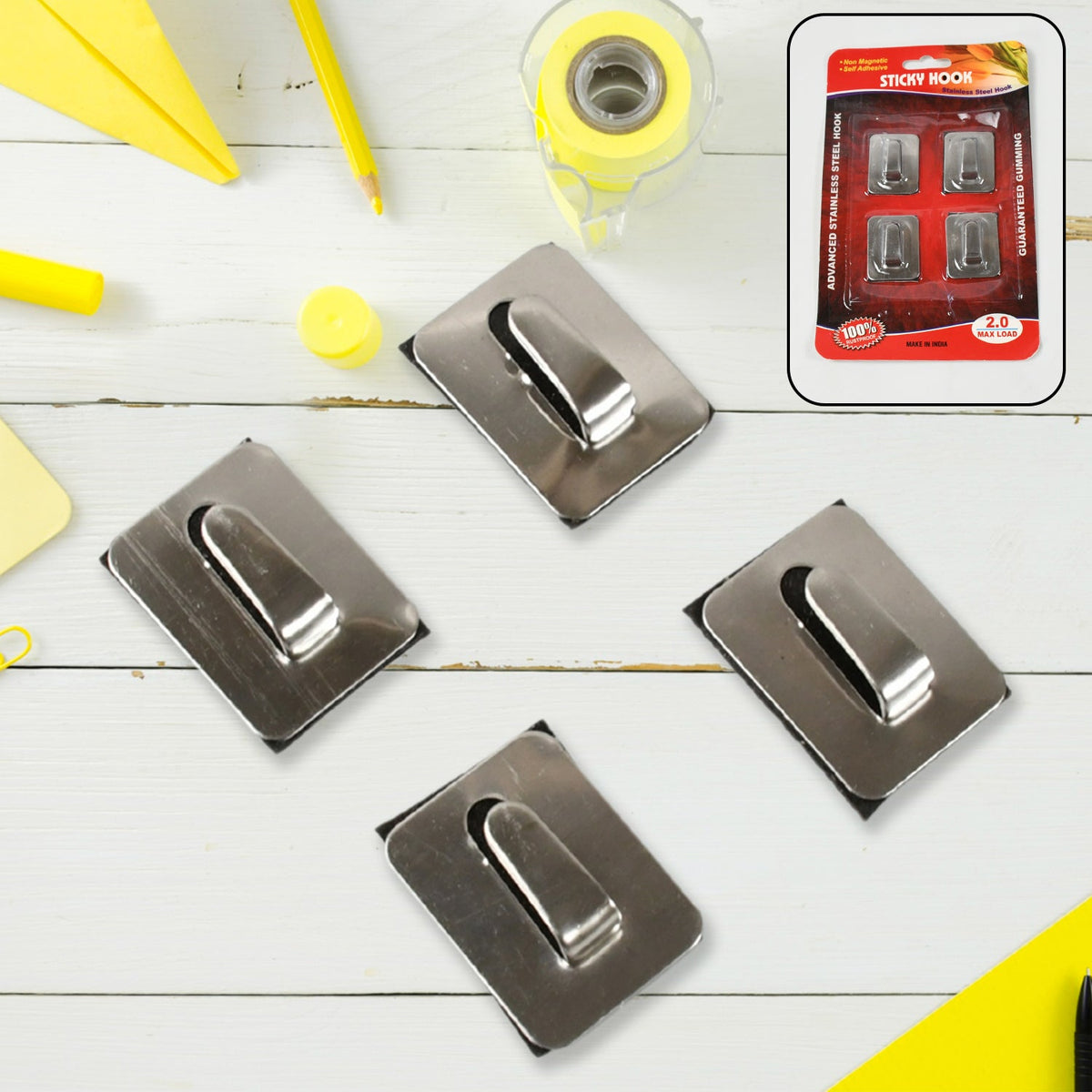 Durable stainless steel self-adhesive wall hooks installed in a modern home. Main image