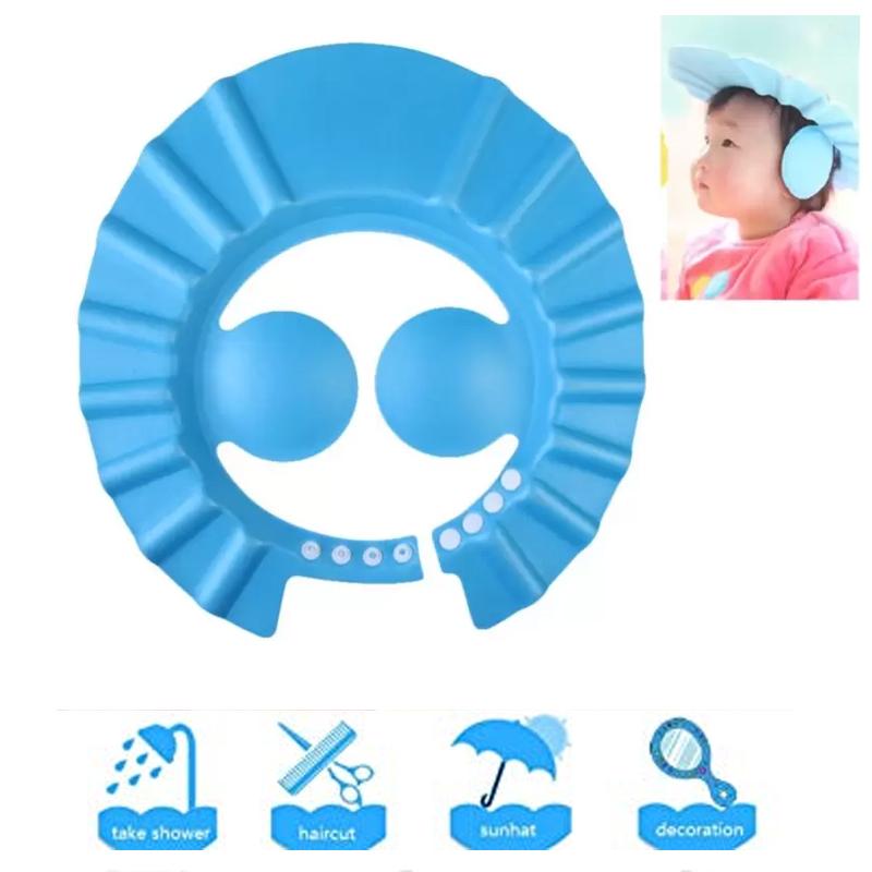 Baby shower cap in blue, adjustable for a snug and comfortable fit. Main image