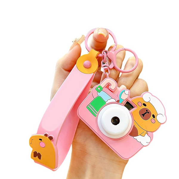 Projective camera keychain projecting vibrant rainbow image effect