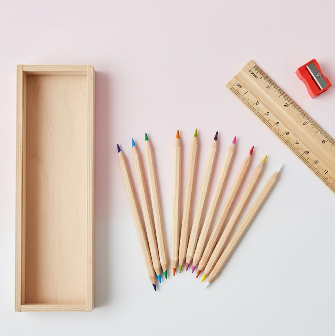A complete 12-piece wooden pencil set with vibrant colors, a box, ruler, and sharpener. Main image