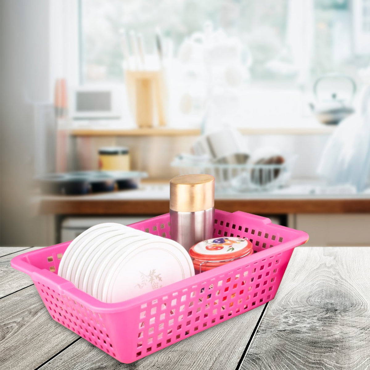 Medium size plastic fruit basket with a cane-style weave, ideal for kitchen counters. Main image