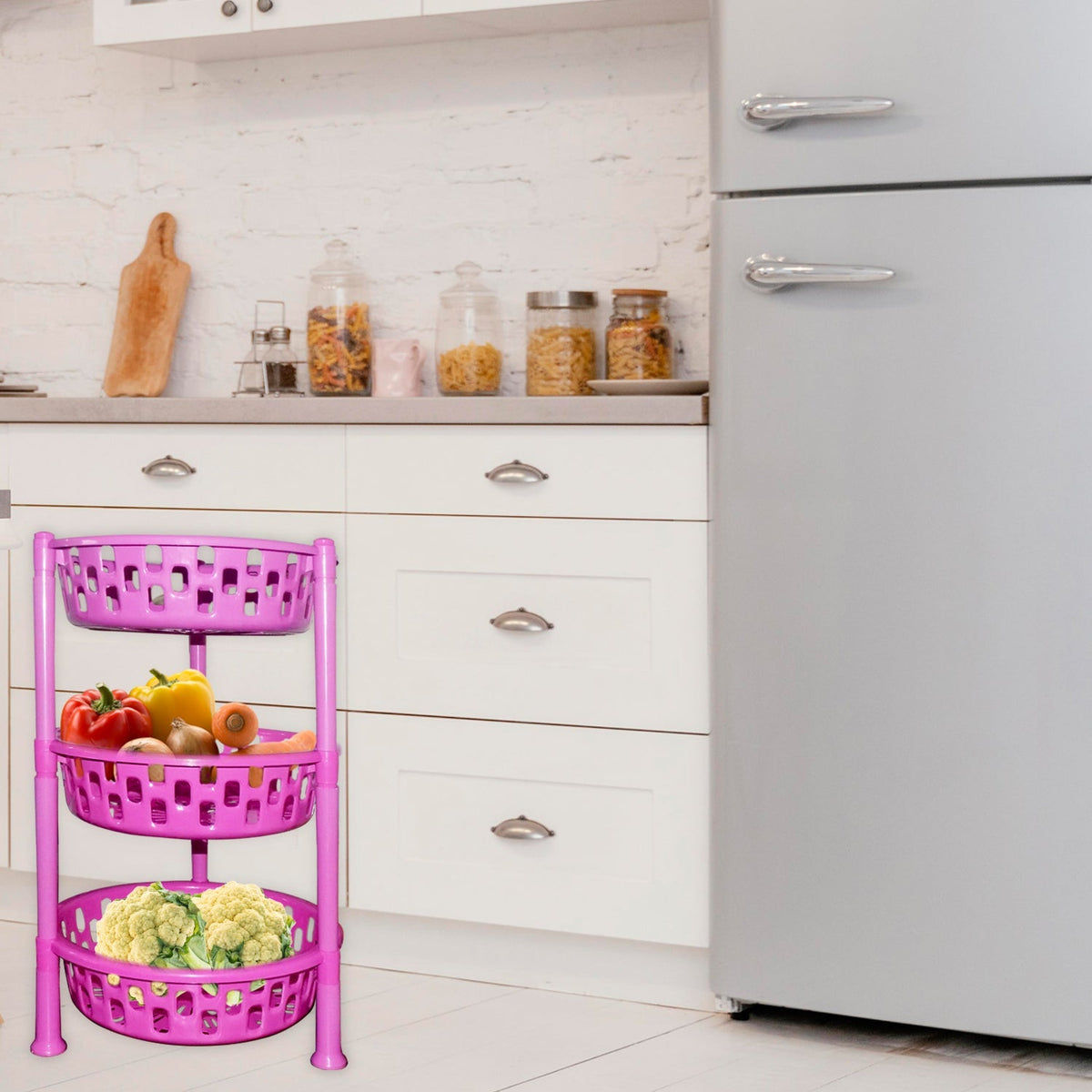 Organivo 3-tier plastic storage rack in a kitchen setting, holding fruits and vegetables. Main image