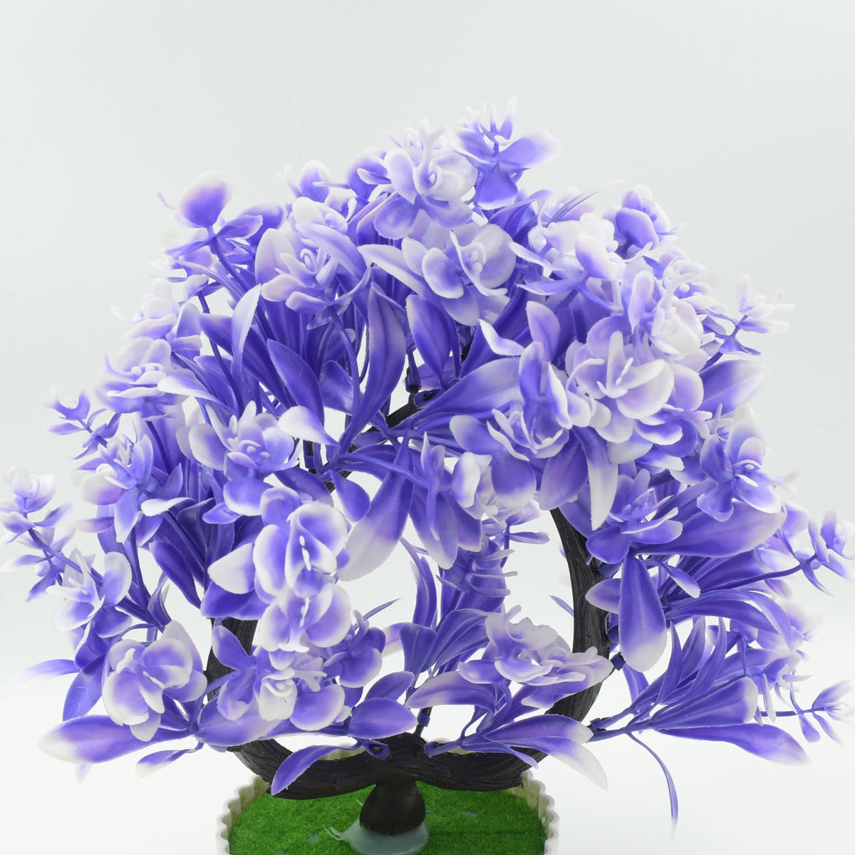 Vibrant artificial flower plant with a white pot, perfect for enhancing home or office desk decor. Main image