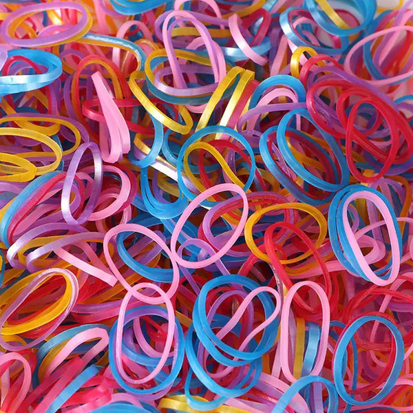 Reusable rubber bands shown stretching, highlighting their flexibility and durability.