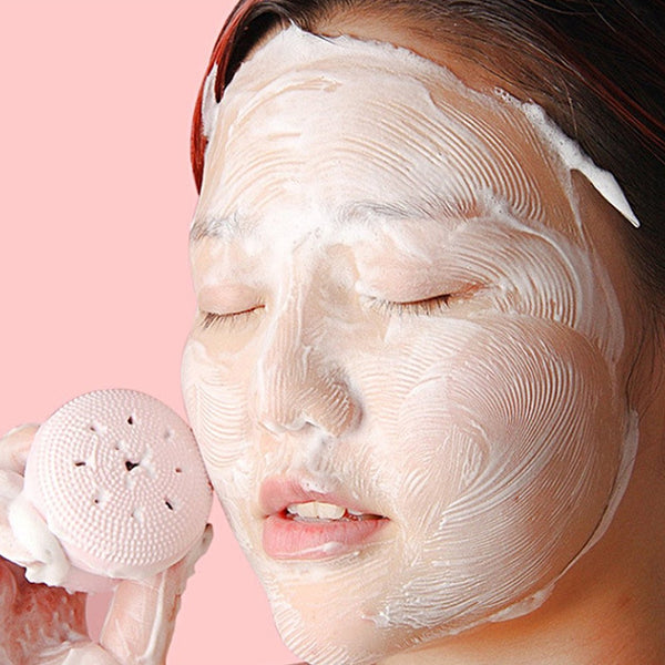 Soft bristles of the silicone facial cleansing brush providing gentle exfoliation.