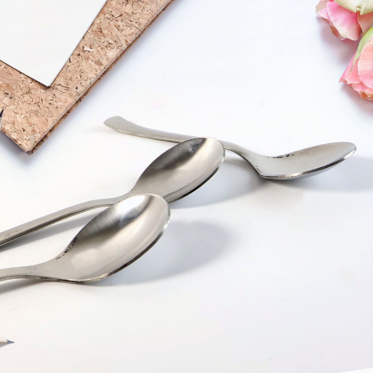 Set of three rust-resistant dining spoons neatly arranged Main image