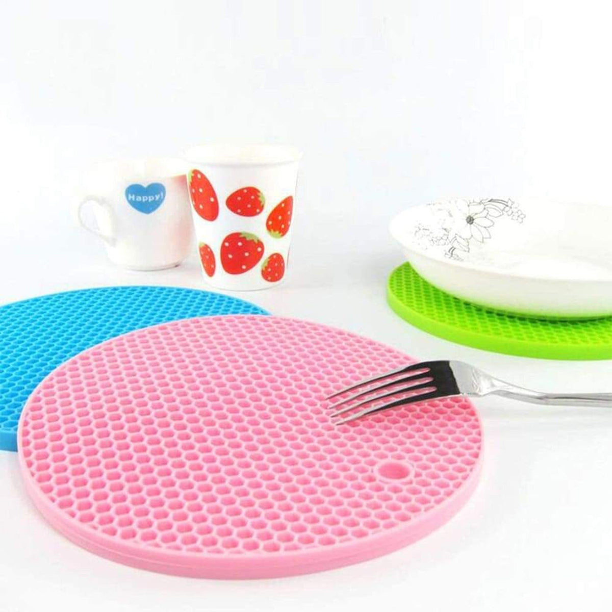 Silicone hot mat in a kitchen setting, protecting a countertop from a hot pot. Main image