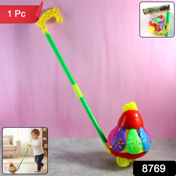 Toddler playing with colorful chicken push toy boosting motor skills