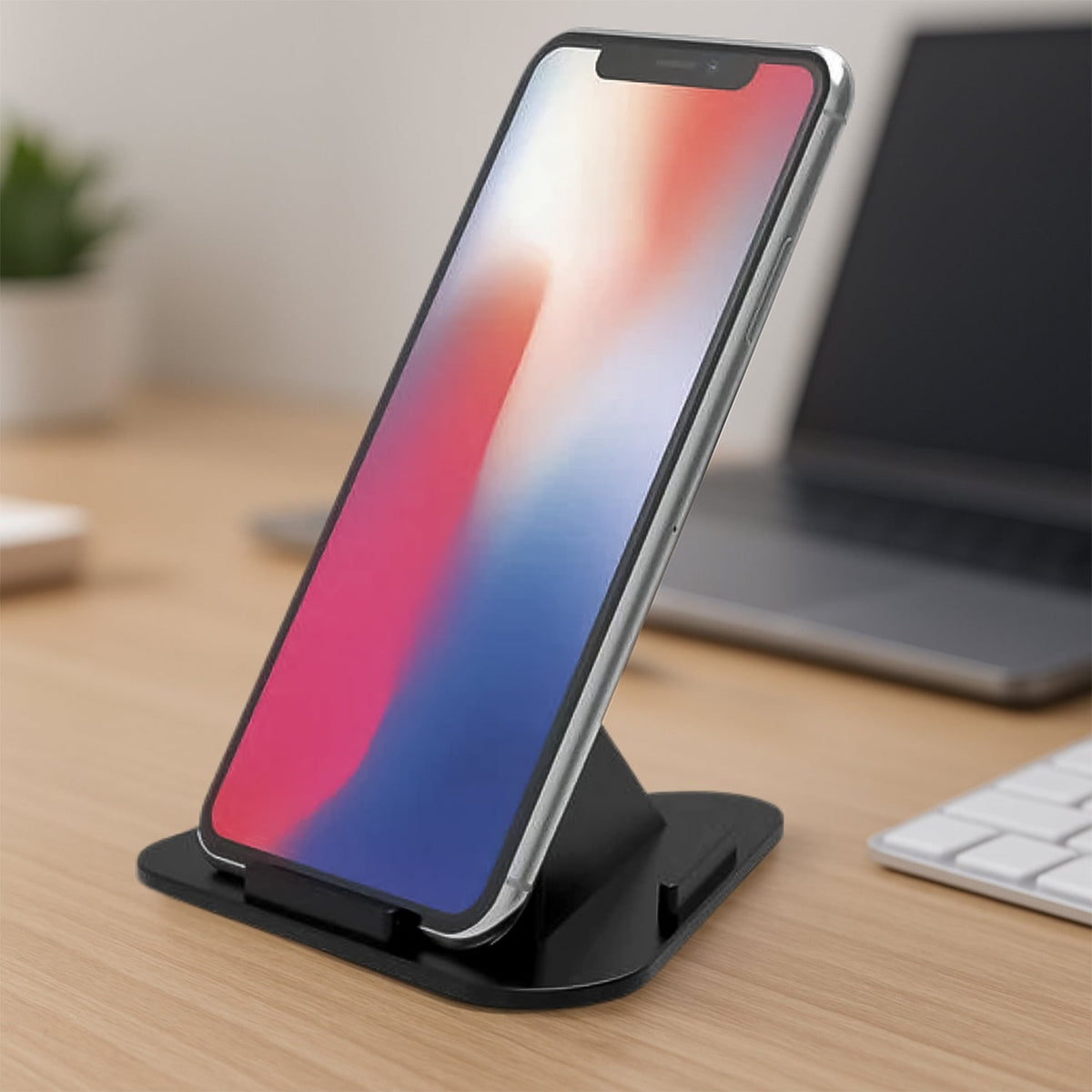 Pack of four Pyramid Mobile Holder Stands in black, showcasing their three-sided design. Main image
