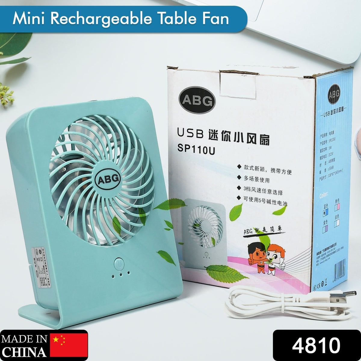 VoltDesk portable desk fan on a wooden desk, showcasing its compact size. Main image