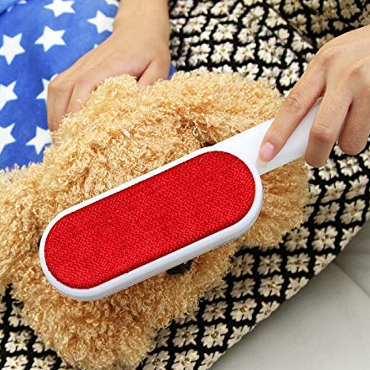 Double-sided pet hair remover brush with self-cleaning base for efficient fur removal. Main image