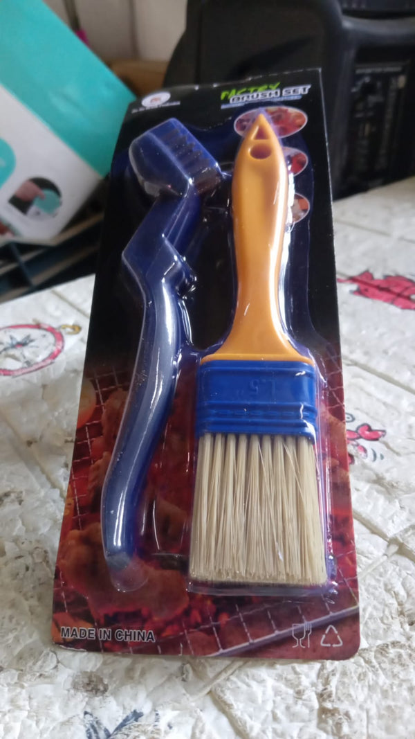 Two basting brushes displayed in a modern kitchen setting.