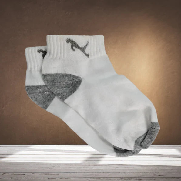A single pair of colourful printed socks for women, laid flat on a white surface. Main image