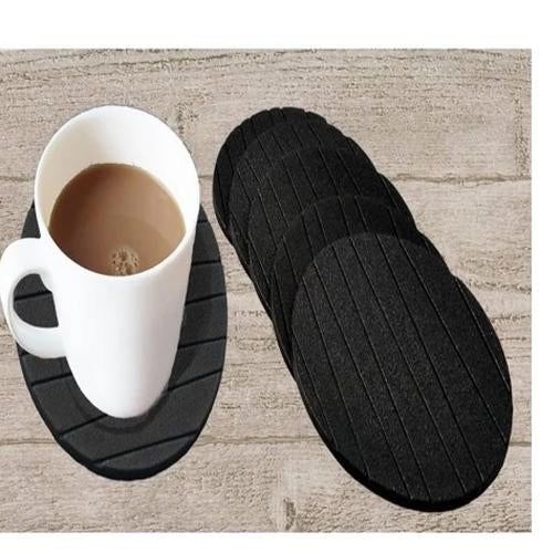 Set of 6 round silicone coasters protecting a table from hot beverages. Main image
