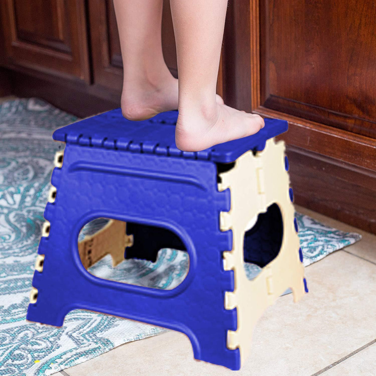Vibrant multicolor 12 inch folding step stool, open and ready for use. Main image