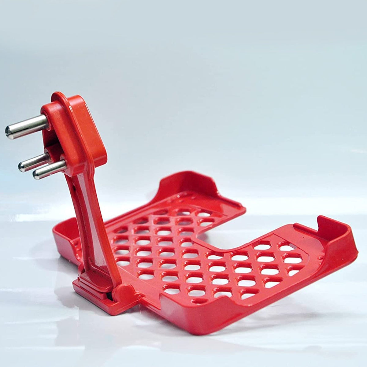 Red mobile charging wall holder mounted on a power socket. Main image