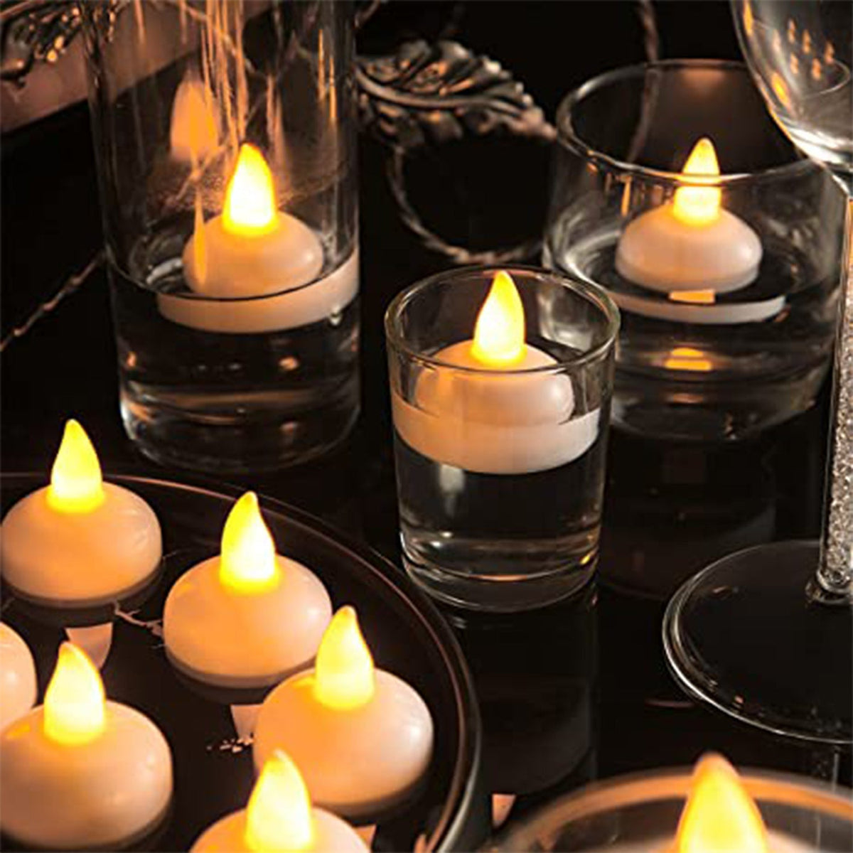 Set of 8 flameless floating candles for decorative lighting. Main image