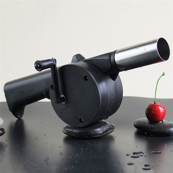 Portable hand crank BBQ air blower fan in black and silver. Main image