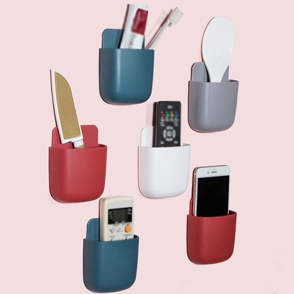 A vibrant multicolour Wall Mounted Storage Box, perfect for organizing remote controls and mobile phones. Main image
