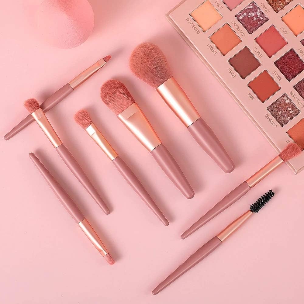 An 8-piece mini makeup brush set with a light pink handle and synthetic bristles, arranged neatly. Main image