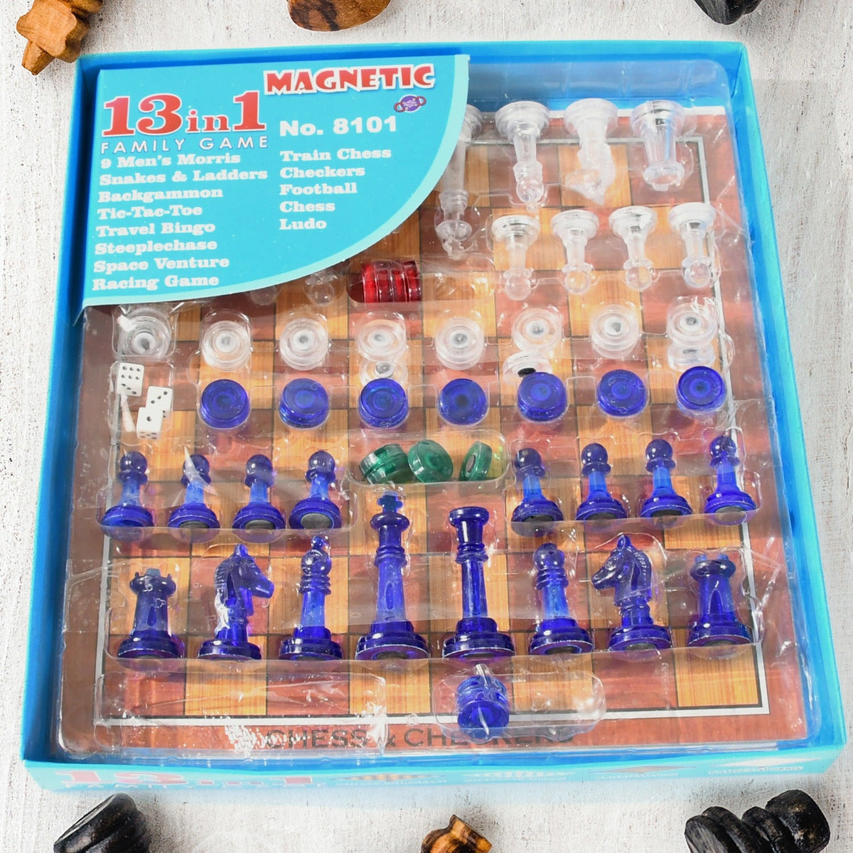 Dollamis 13-in-1 Family Board Game Set displayed with chess pieces and other game boards. Main image