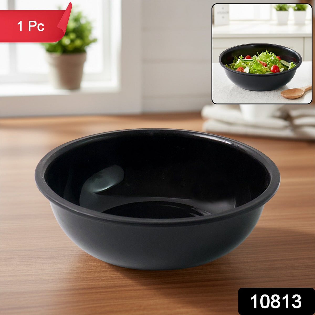 Black plastic serving bowl filled with curry showing deep design Main image