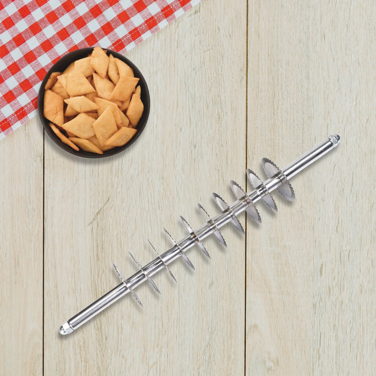 Stainless steel dough cutter with multiple wheels for uniform noodle and pastry cuts. Main image