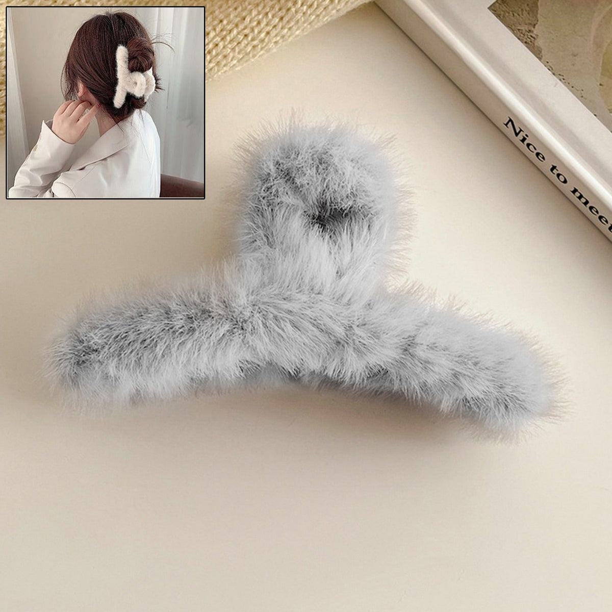 Elegant plush hair claw clip in a vibrant color, perfect for securing hair. Main image