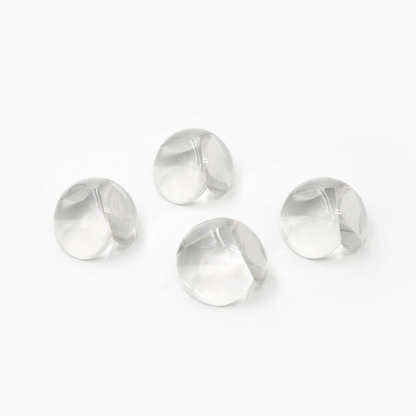 Effective clear corner protectors on a table edge, pack of 4.