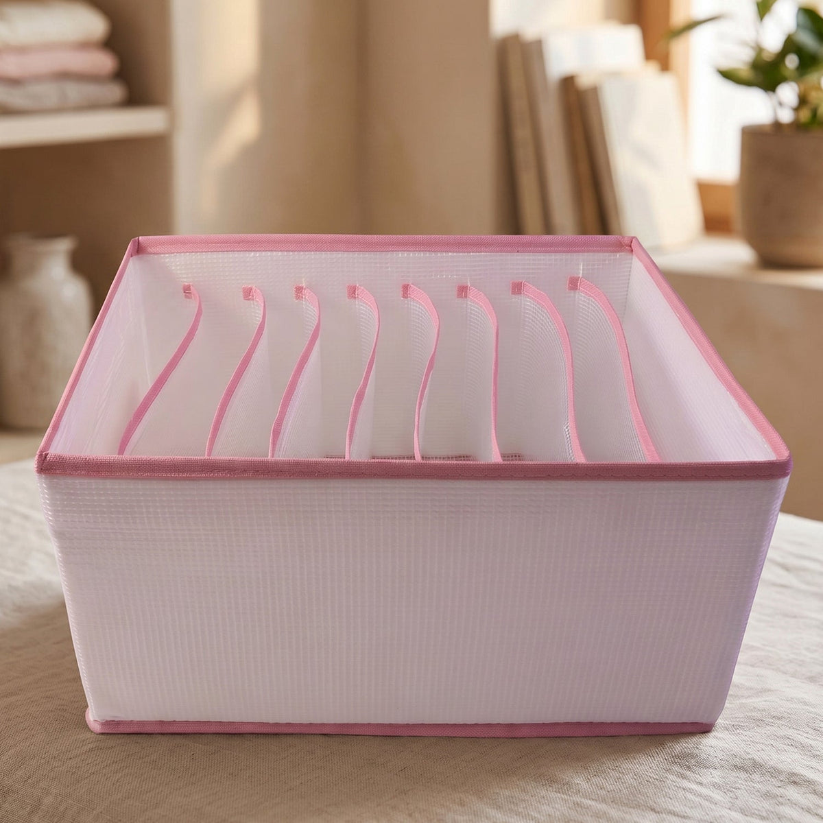 Foldable clothes organizer in use with clothes stored in compartments Main image