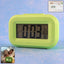 Digital alarm clock showing time, date, day, and temperature clearly on display