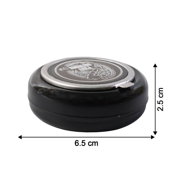 Tabletop ashtray showing deep container for ash collection