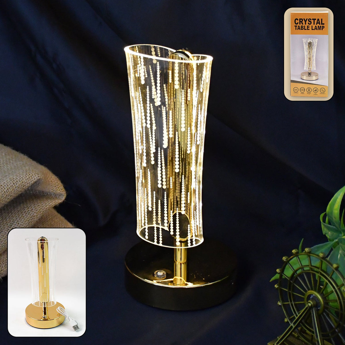 Crystal table lamp with cylindrical crystal-cut shade and golden base Main image