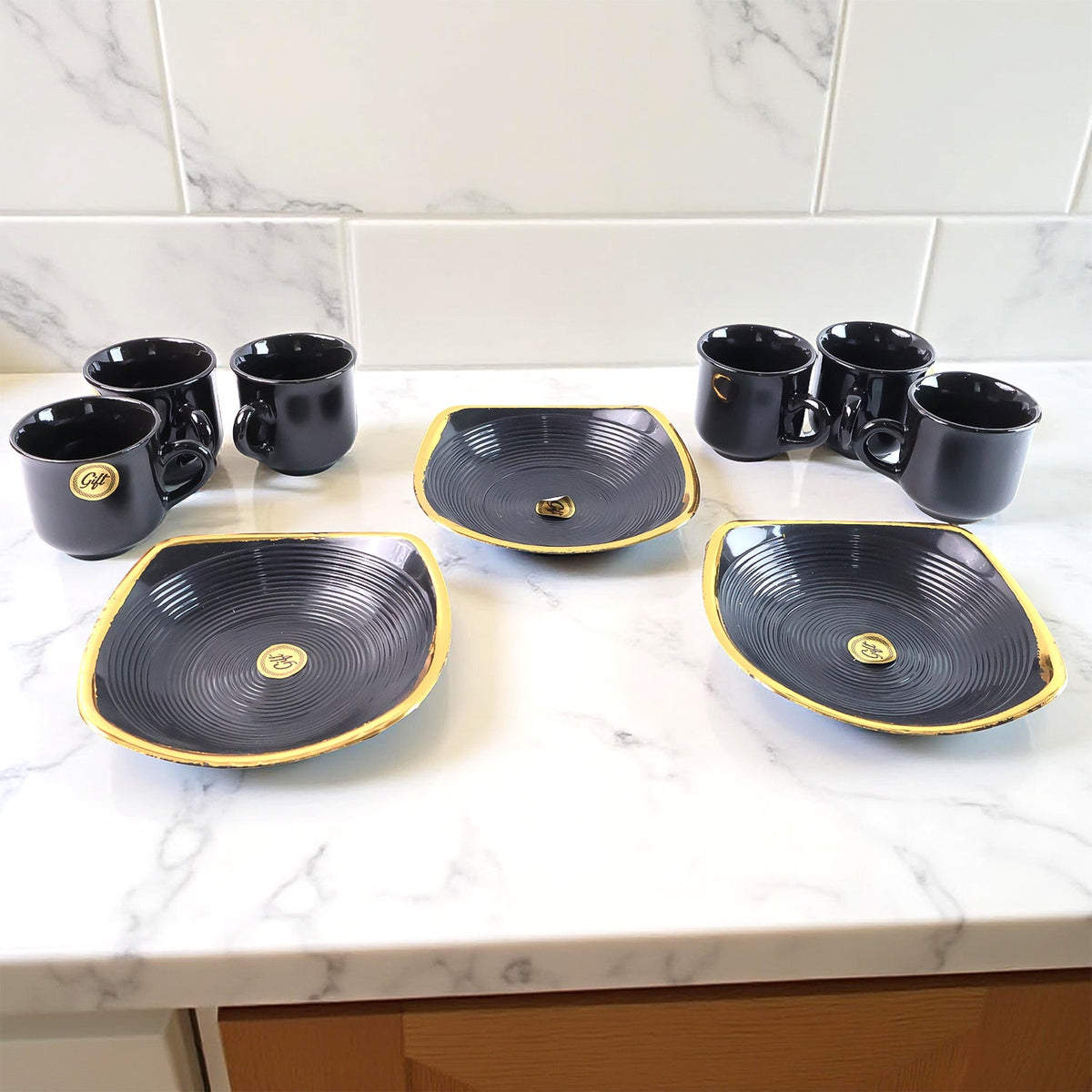 Elegant seashell ceramic cup set with matching plastic bowls arranged for serving. Main image