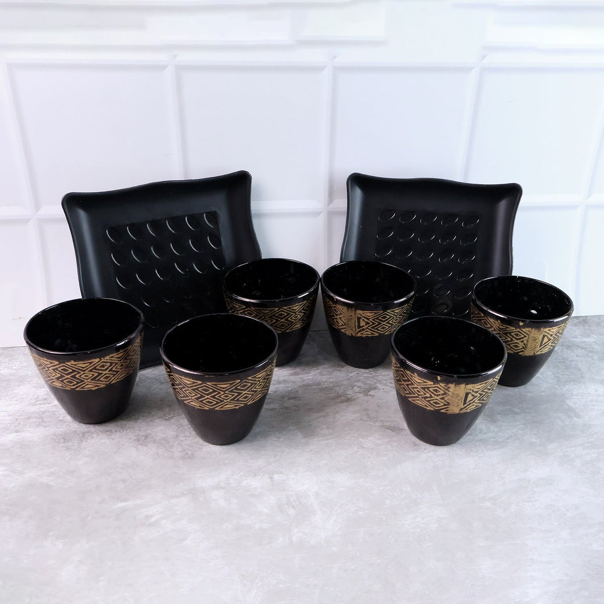 Complete 8-piece ceramic bowl and cup set elegantly displayed for dining. Main image