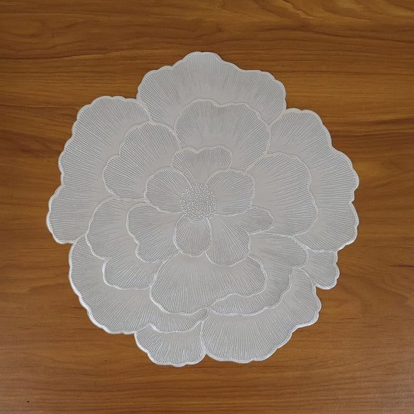 Live setting featuring floral PVC table mat