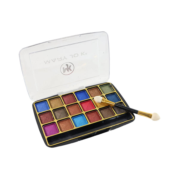 Close-up of bold shimmer eyeshadow shades in palette with vibrant colors