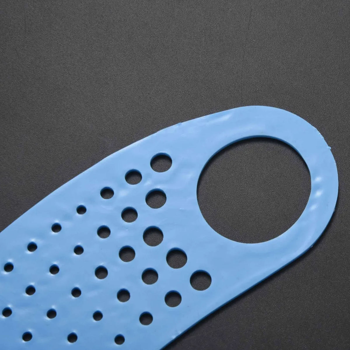 Person using face mask ear saver strap for reusable mask comfort Main image