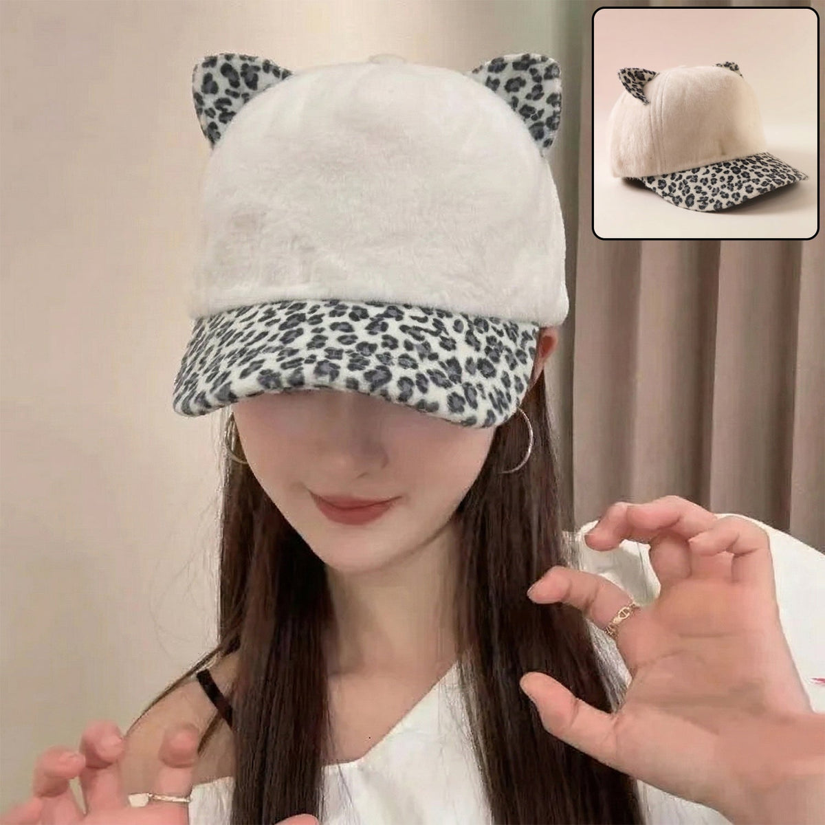 Front view of stylish cat ear fur cap with printed visor Main image