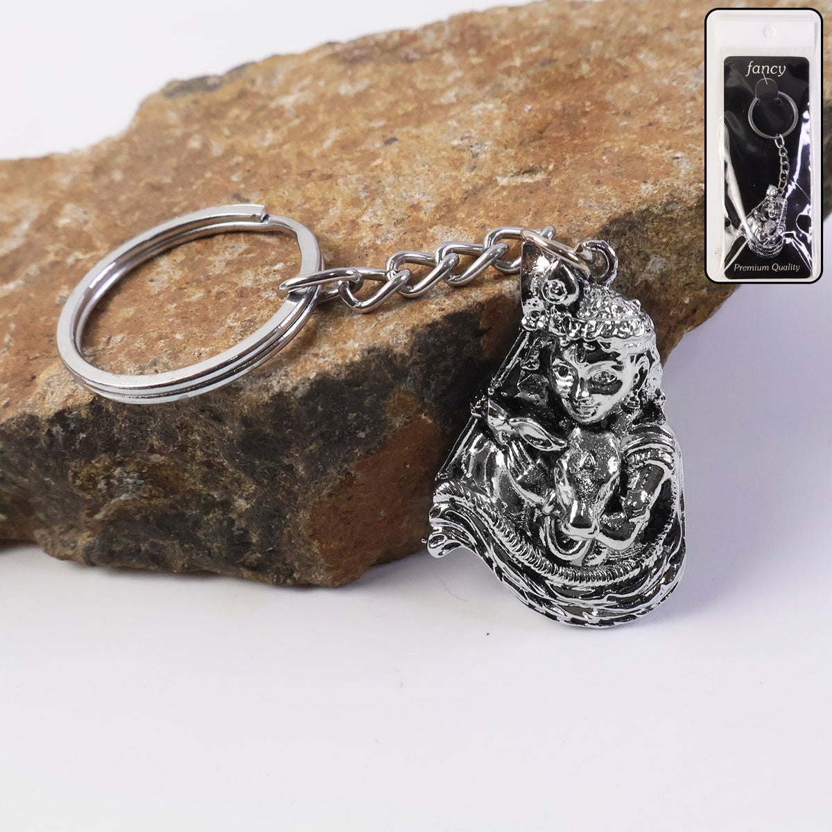Silver finish metal keychain with detailed Bal Krishna idol charm Main image