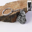 Silver finish metal keychain with detailed Bal Krishna idol charm