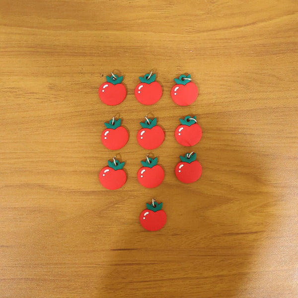 Novelty red apple bag accessory with playful design