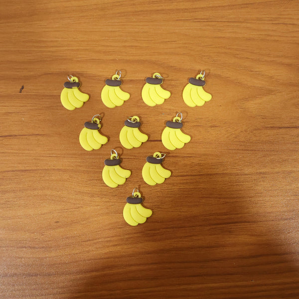 Assorted banana-shaped bag charms in set