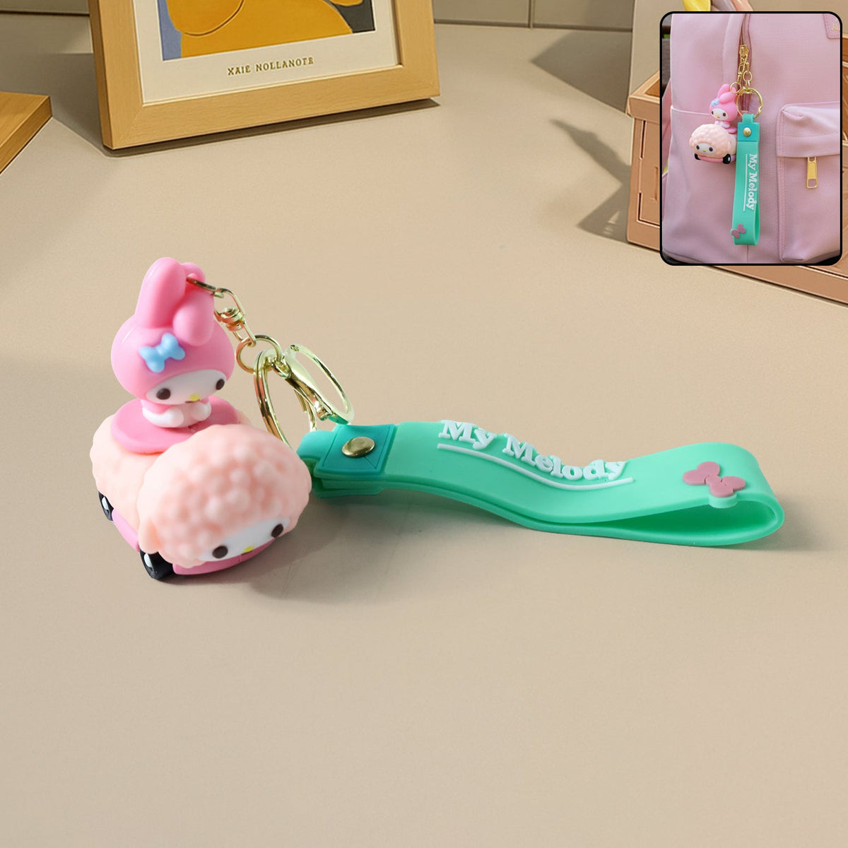 Close-up of cartoon silicone keychain with flexible strap on white background Main image