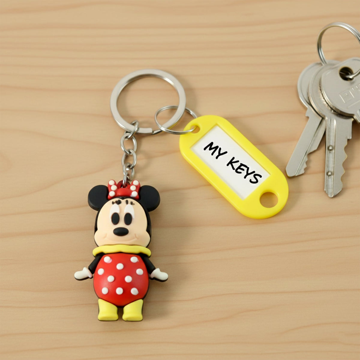 Cartoon character keychain with assorted designs and name tag Main image